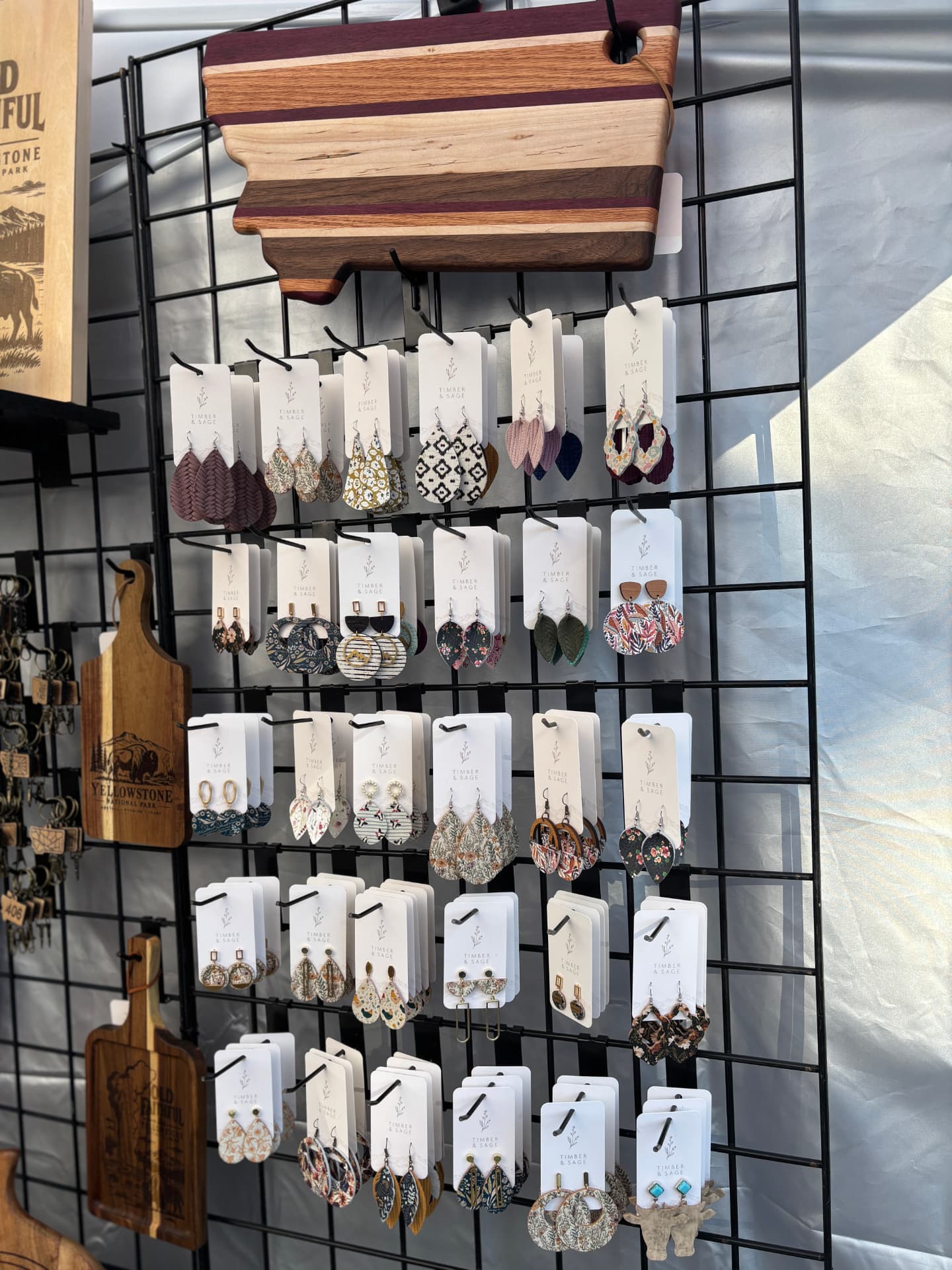 Hand-cut leather earrings in sage and tan